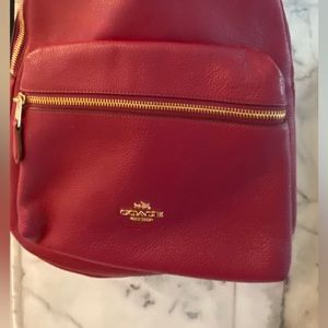 Coach fuschia leather backpack
